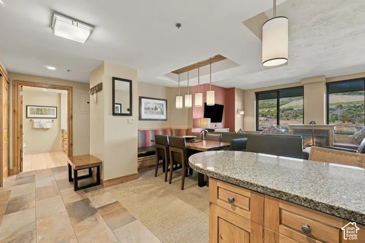 Granite-style countertop on wood-finish cabinetry