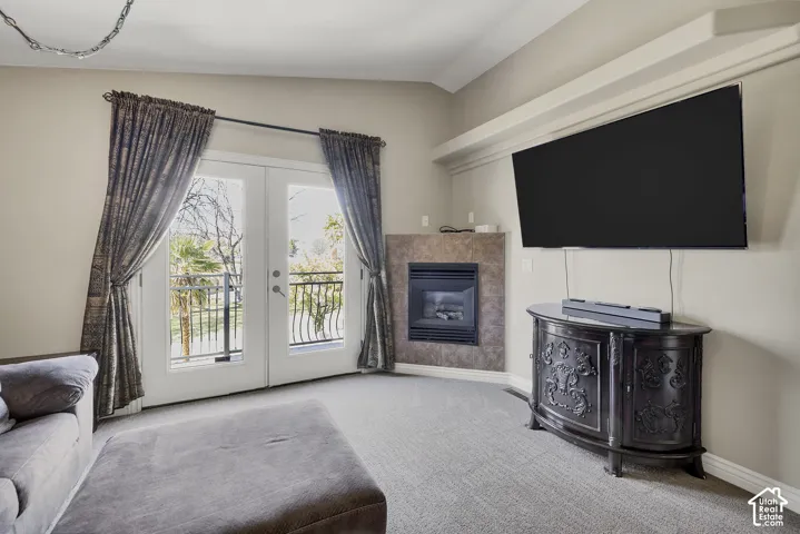 Double French doors opening to a balcony with an ornate railing