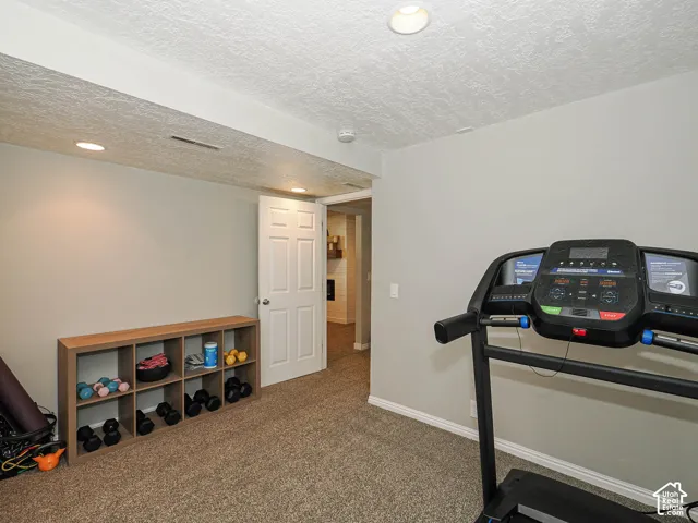 Recessed lighting and textured ceiling