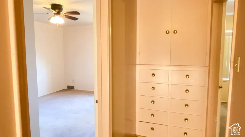 Built-in cabinetry with brass hardware