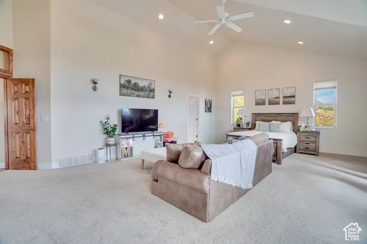 Vaulted ceilings and recessed lighting create an expansive atmosphere