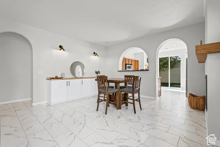White tiled flooring with subtle veining