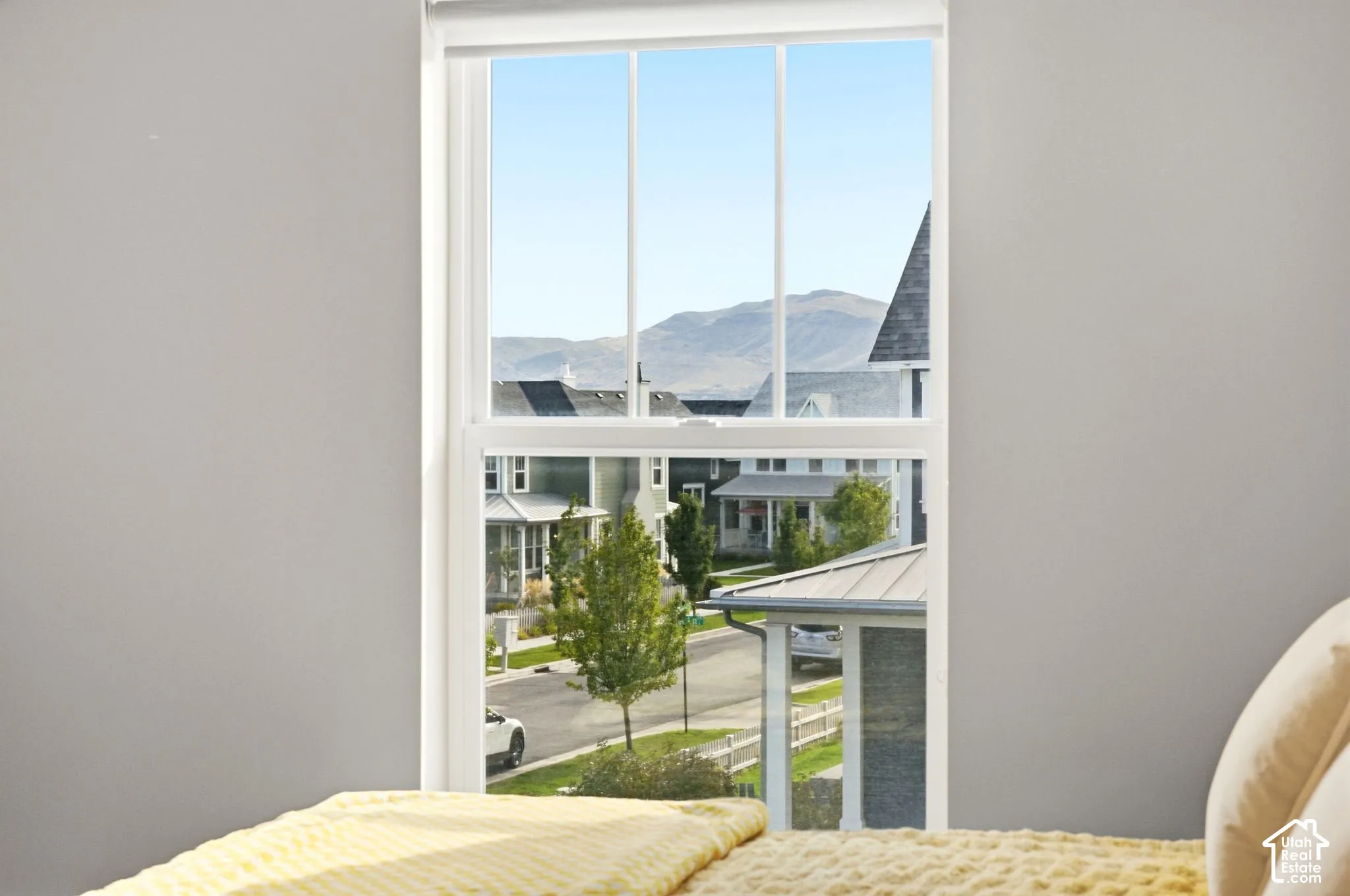Double-hung window providing mountain scenery