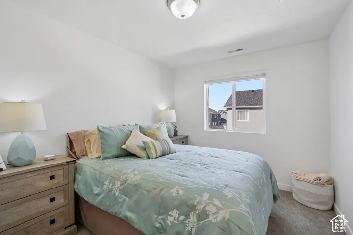 Recessed window with white trim, wall-to-wall carpeting, and a flush mount ceiling fixture