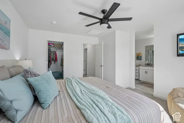 Recessed lighting, ceiling fan, and carpeted flooring