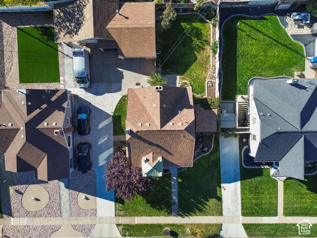 Drone photo of home, yard, garage and shared driveway