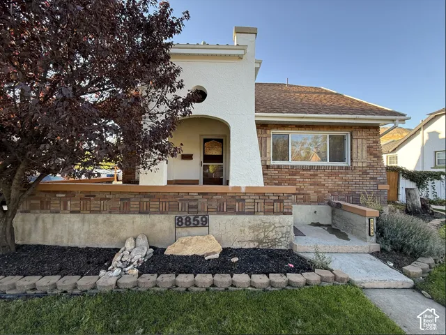 Classic brick details and architectural covered front porch