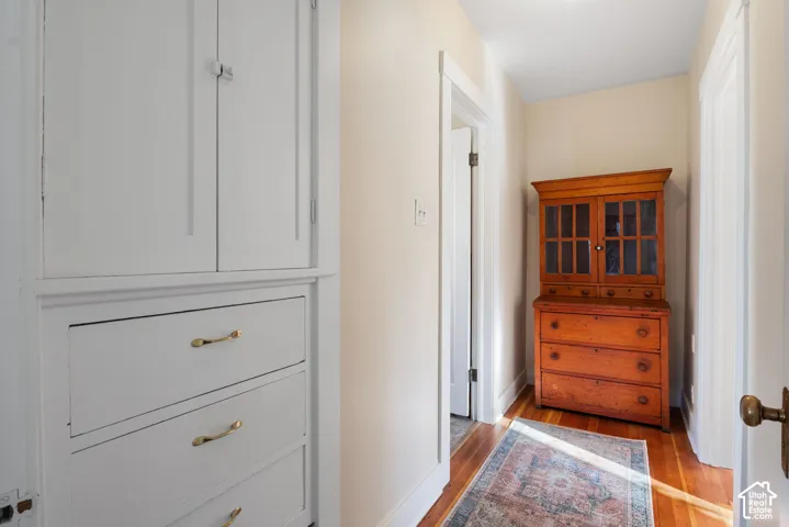 Built-in white cabinetry with brass hardware