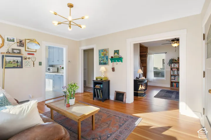 Living room with views to second living room, kitchen and bedroom hallway.