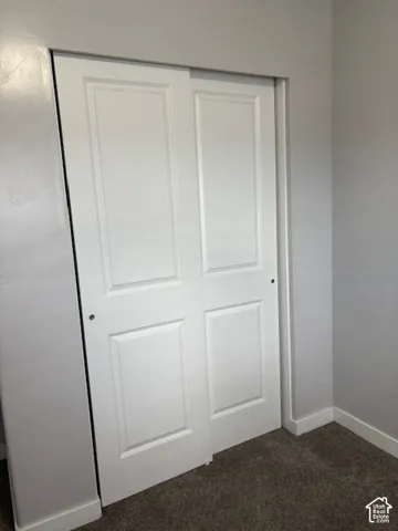 White bi-fold doors with panel detailing