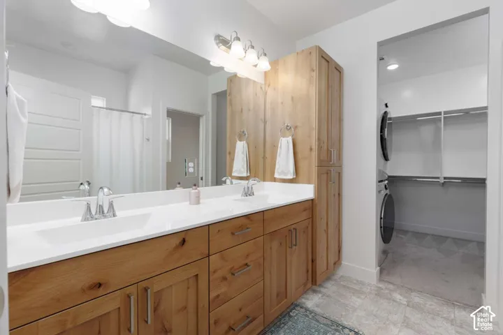 Dual vanity with integrated sinks and wood-finish cabinetry