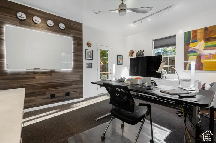 Wood-finish accent wall with integrated backlit whiteboard