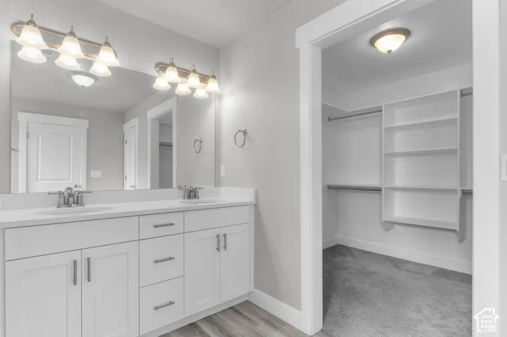 Dual vanity with undermount sinks and chrome fixtures