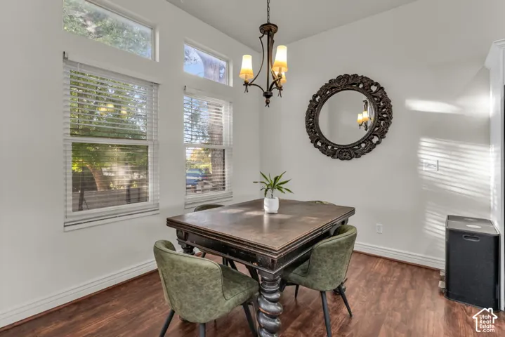 Wood-finish flooring with white baseboards