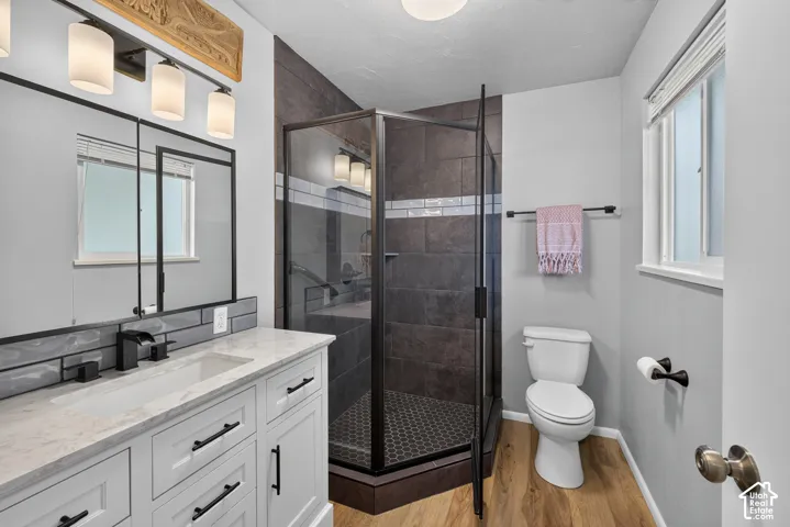 White vanity with an integrated sink and matte black hardware