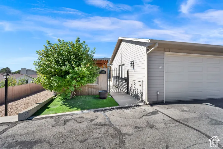 Attached garage with paneled door
