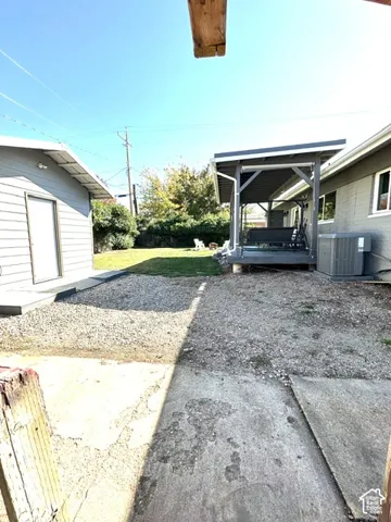 Covered patio structure with dark gray finish