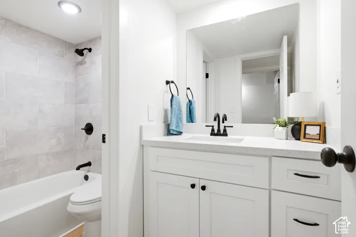 New Tile, New Cabinets, New Faucets