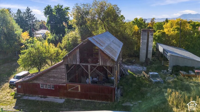 Red-painted barn with a corrugated metal roof