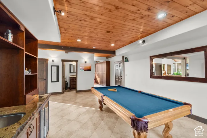 Wood panel ceiling with recessed lighting