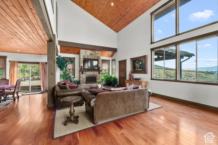 Vaulted wood-paneled ceiling with exposed beam accents