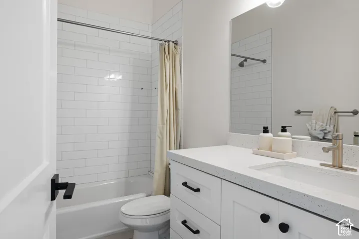 White subway tile shower surround with a built-in tub