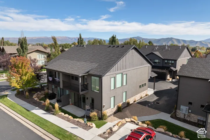 Contemporary exterior featuring a textured facade and dark trim