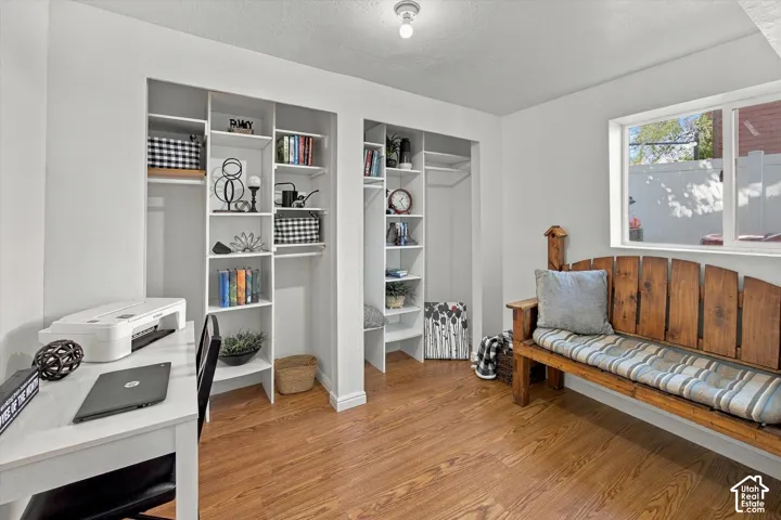 5th Bedroom or office.  Wood-finish flooring, built-in shelving