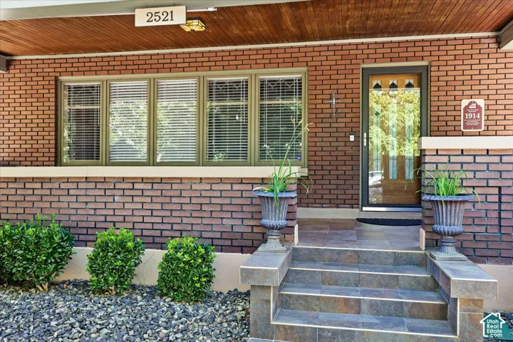 Brick facade with a contrasting wood-finish soffit