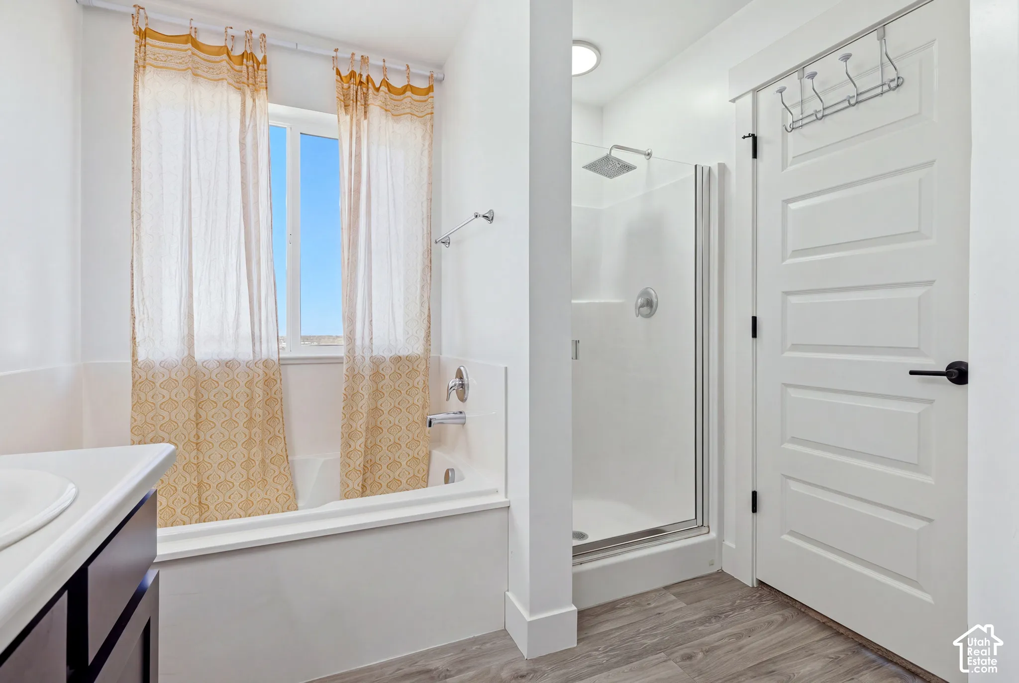 White paneled door with black hardware