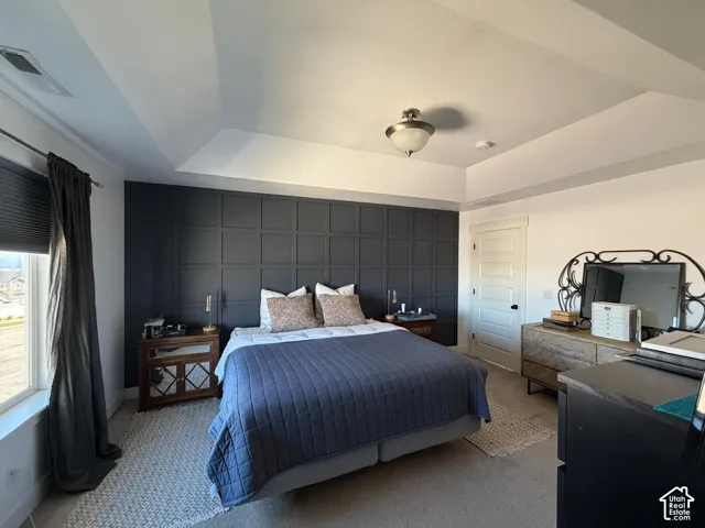 Tray ceiling with a central flush mount light fixture