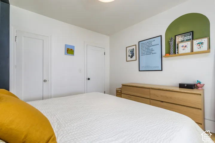 Arched wall niche with a wood-finish display shelf