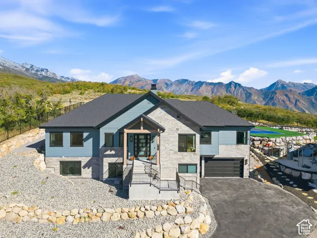 Modern architectural design with stone and siding exterior