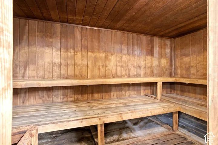 Wood-paneled interior featuring built-in wooden benches