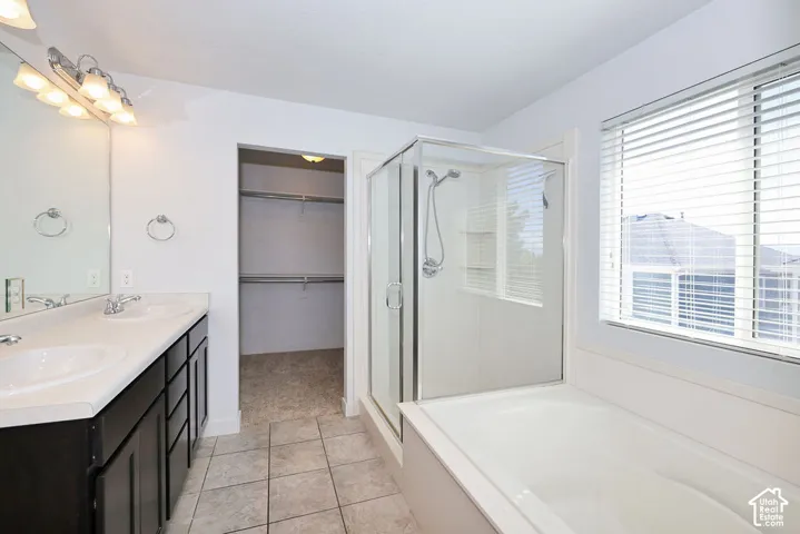 Dual vanity with dark wood-finish cabinetry and light-toned countertops