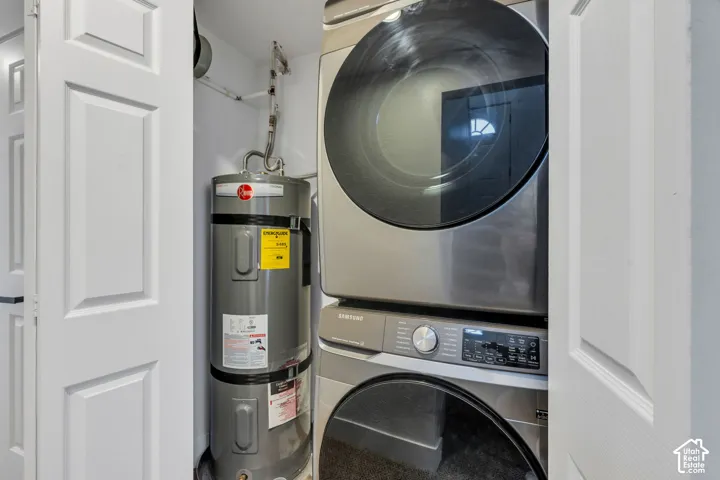 Space-saving laundry appliances with a stacked washer and dryer, accompanied by a water heater unit