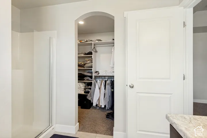Primary Bedroom walk-in closet