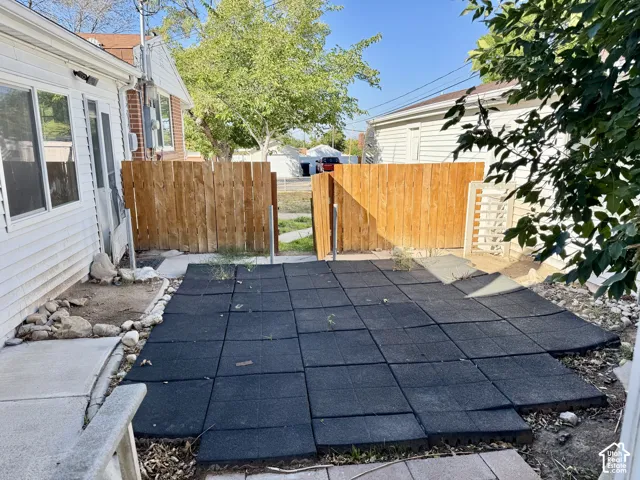 Outdoor patio area featuring modular black surfacing