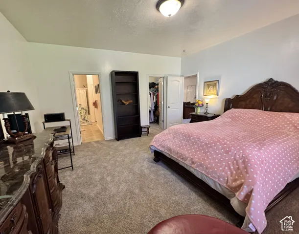 Primary Bedroom with Walk-in Closet and Full bathroom.