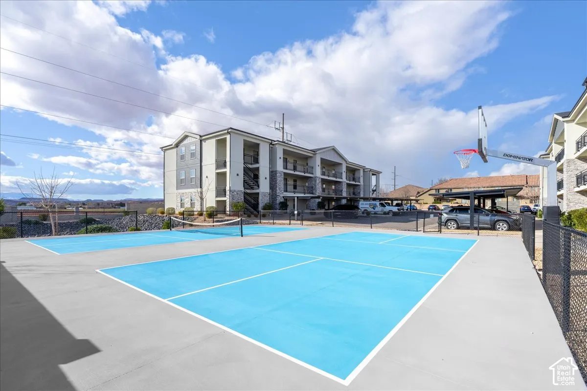 Multi-sport court featuring vibrant blue surfaces