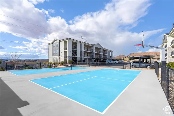 Multi-sport court featuring vibrant blue surfaces