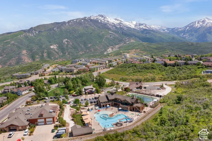 Expansive mountain landscape with snow-capped peaks