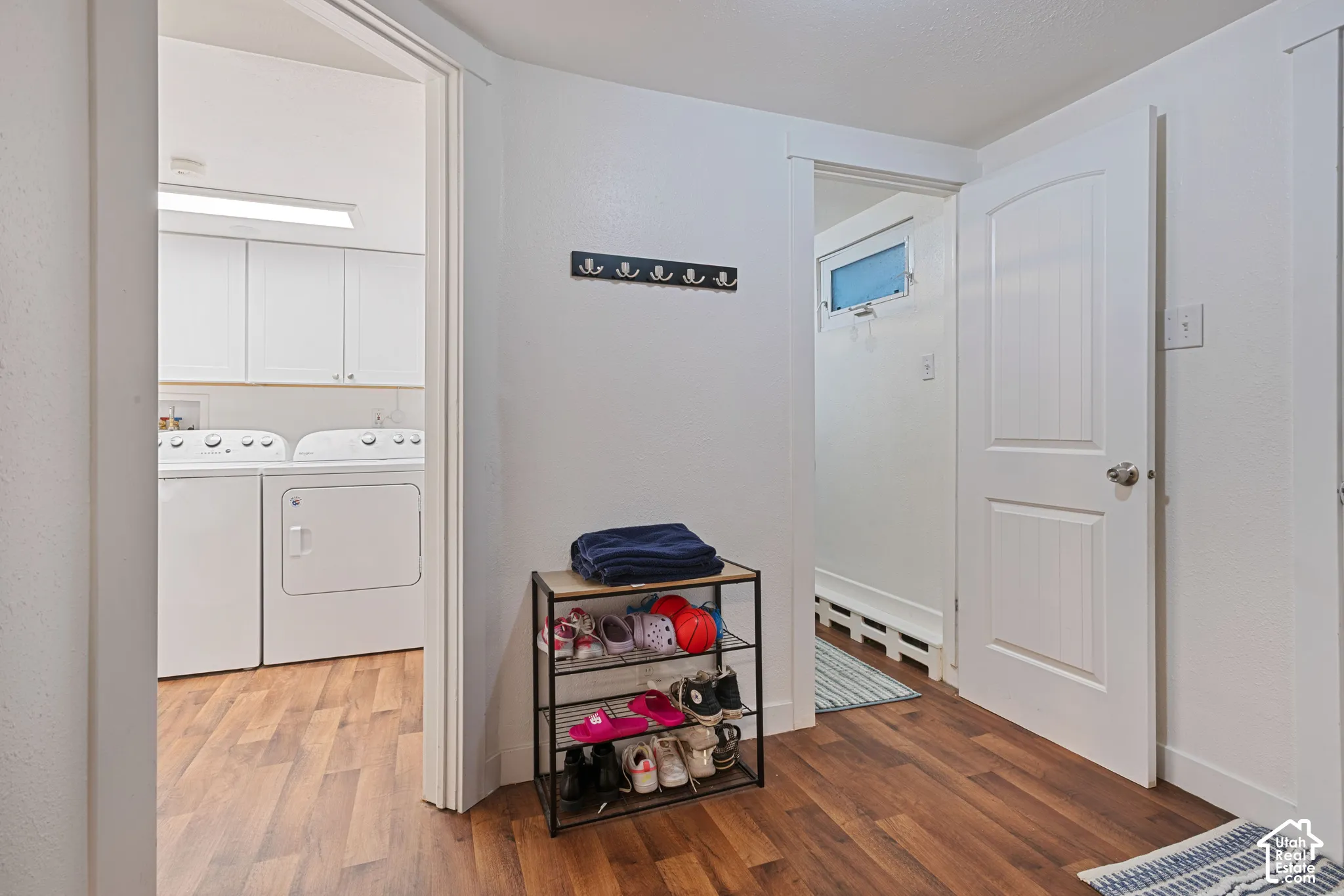 Basement entry - view of laundry and bathroom