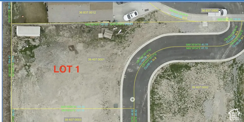 Plat Map. Illustrating the boundaries and dimensions of Lot 1 within the property, including adjacent parcel identifiers and road infrastructure