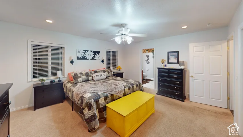 Recessed lighting, ceiling fan, carpet flooring, window with blinds, and paneled interior doors