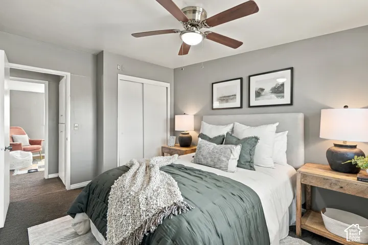 Recessed lighting with a ceiling fan, light-toned walls, and sliding closet doors