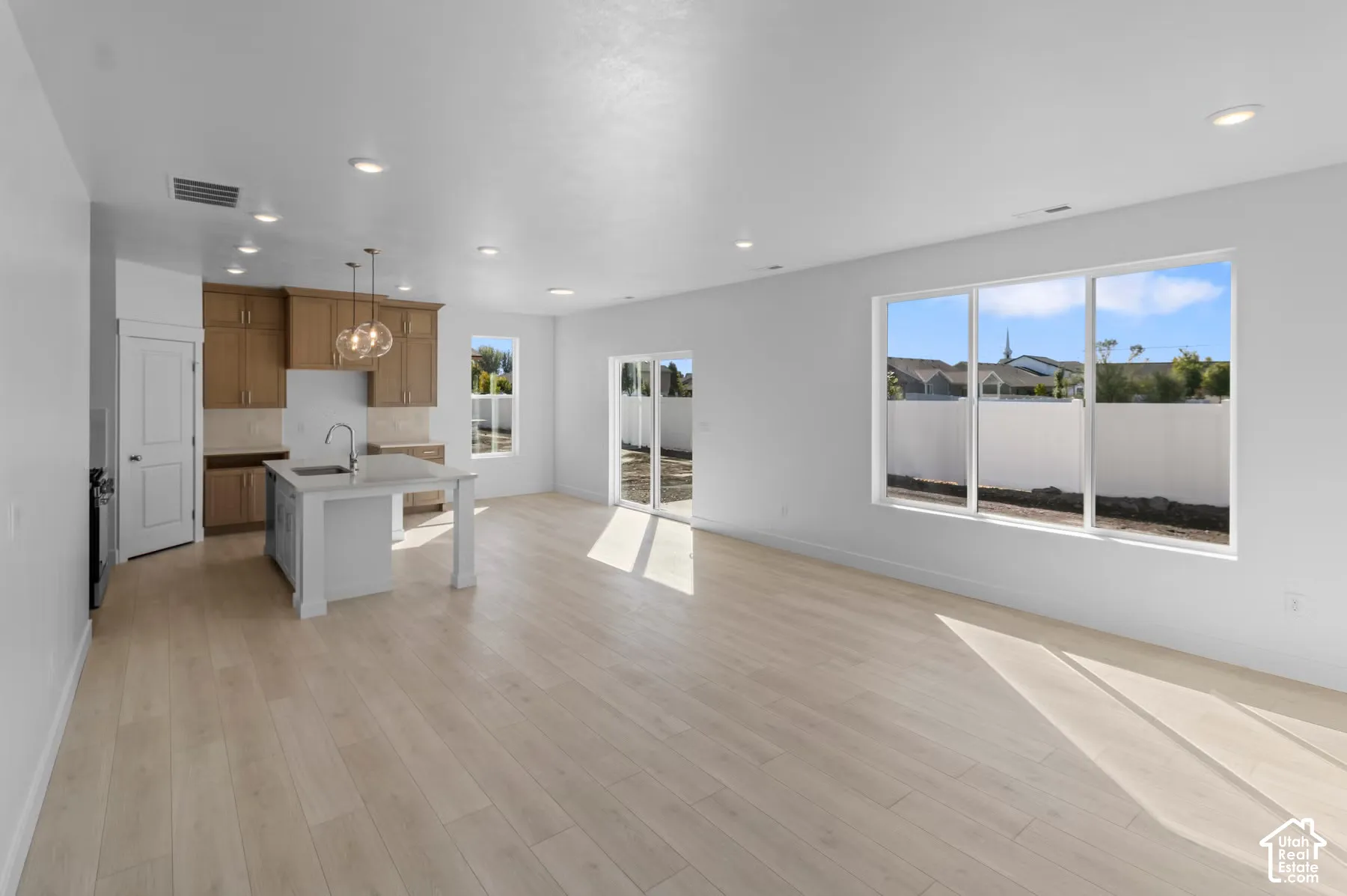 Large great room, dining area, and kitchen