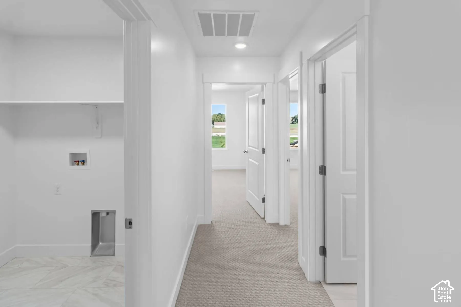 laundry room conveniently located on same floor as the bedrooms