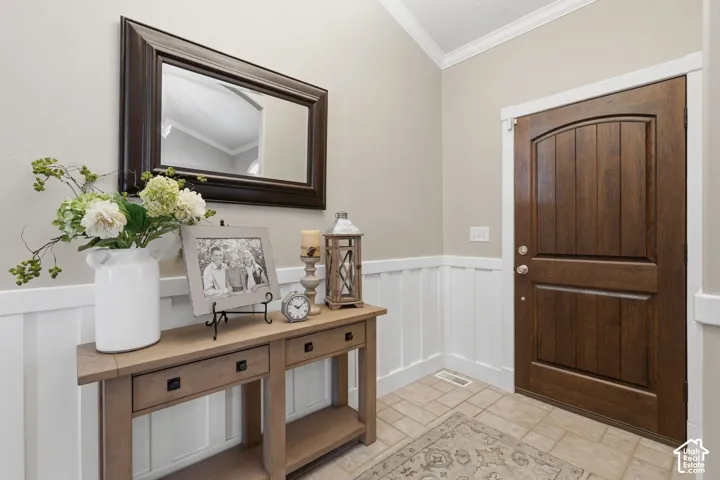 Arched panel door with durable hardware