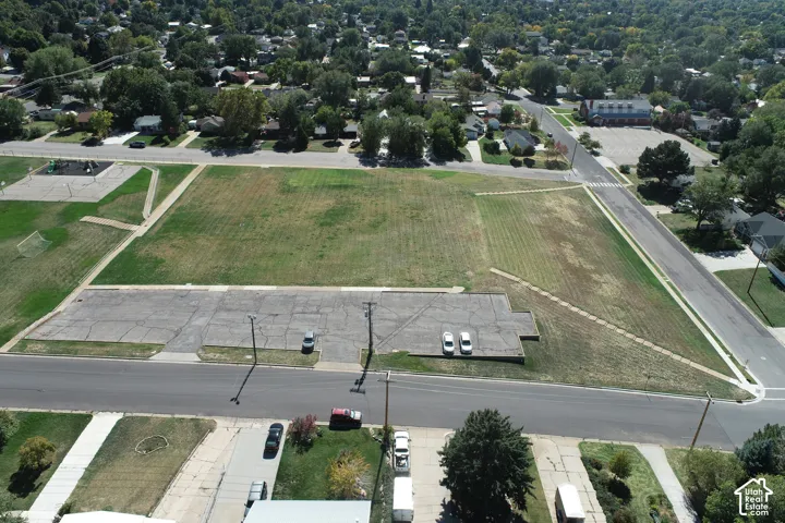 Expansive lot featuring a substantial paved area